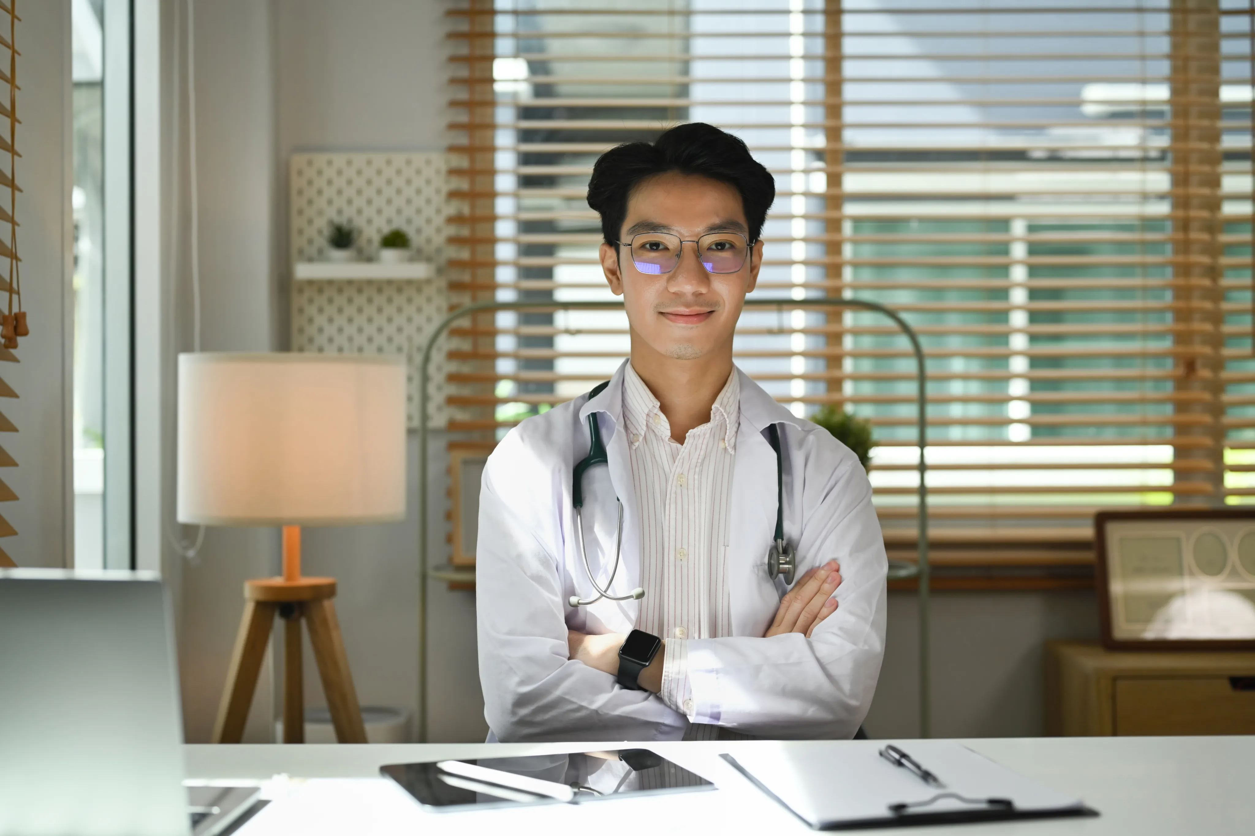 Licensed doctor reviewing a patient intake on a laptop
